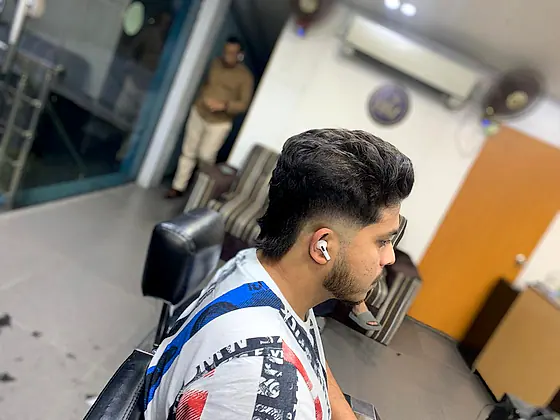 A finished men's haircut at New Hair Masters, shown from several angles